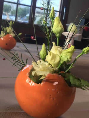 tischdekoration restaurant ton blumen orange