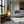 Moderne Unikat Stehleuchte aus Nussbaumholz im Wohnzimmer